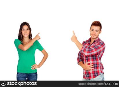 Brunette girl and a handsome boy pointing something isolated on a white background