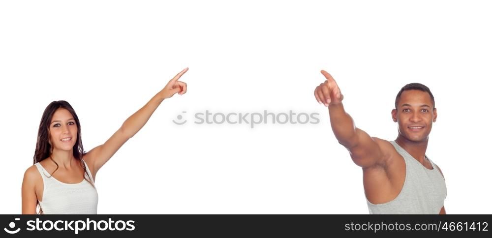 Brunette girl and latin men pointing something isolated on a white background
