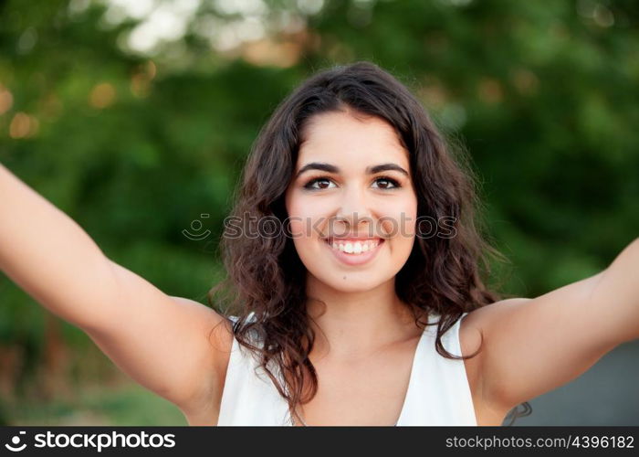 Brunette girl getting a photo in park