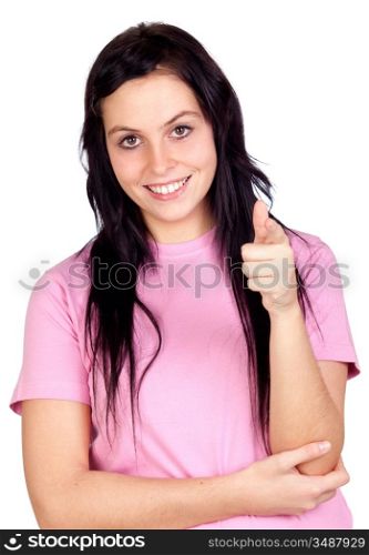 Brunette girl pointing at the camera isolated on a over white background