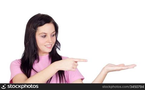 Brunette girl pointing her hand palm isolated on a over white background