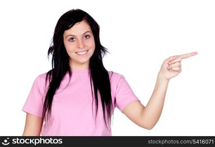 Brunette girl pointing isolated on a over white background