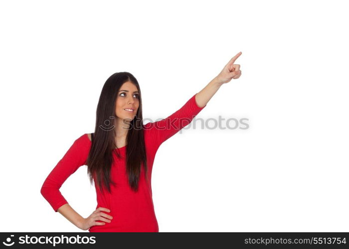 Brunette girl pointing something with her finger isolated on white background