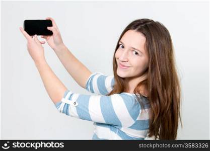 Brunette Girl using touchscreen of a Smartphone