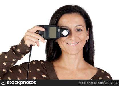 Brunette girl with a photometer isolated on white background