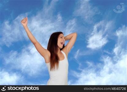 Brunette girl yawning and stretching morning with a blue background of background