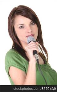 Brunette holding microphone