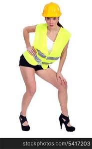 Brunette in construction worker outfit