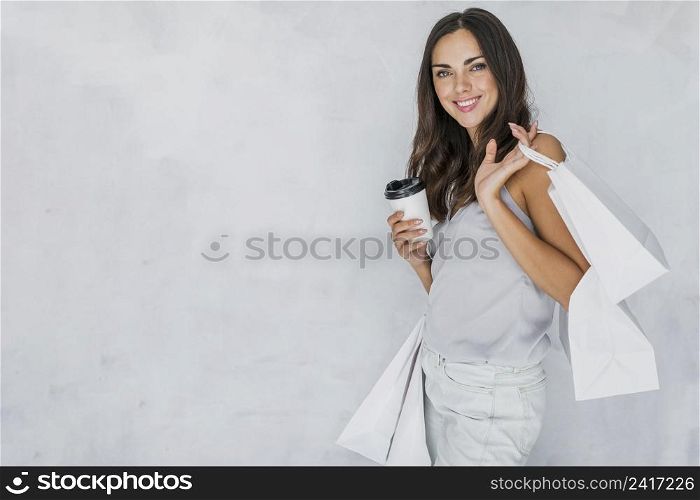 brunette lady undershirt with shopping nets coffee