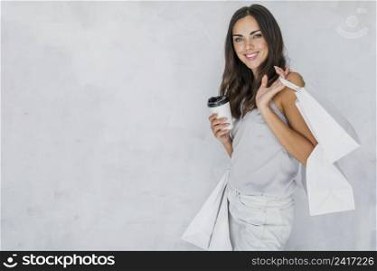 brunette lady undershirt with shopping nets coffee
