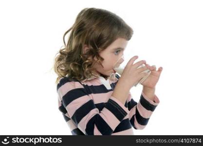 brunette little girl drinking glass of milk isolated on white