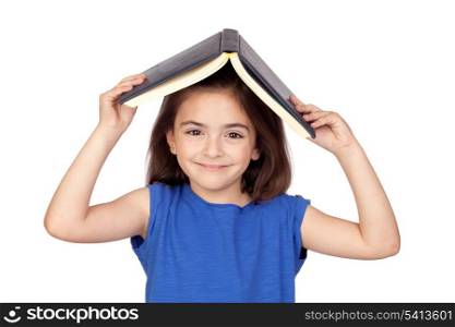 Brunette little girl with a book on her head isolated on a over white background