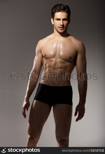 Brunette man with muscular body
