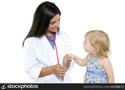 Brunette pediatric doctor with blond little girl on medical exam