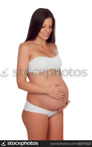 Brunette pregnant in underwear isolated on a white background