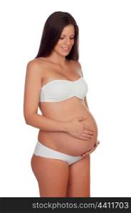 Brunette pregnant in underwear isolated on a white background