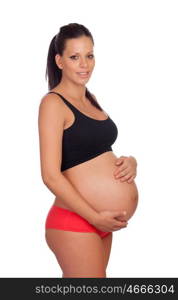 Brunette pregnant in underwear isolated on a white background