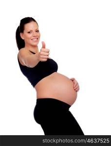 Brunette pregnant woman saying Ok isolated on a white background