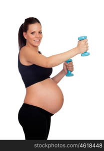 Brunette pregnant woman training with dumbbells isolated on a white background