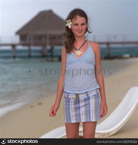 Brunette standing on beach at Moorea in Tahiti