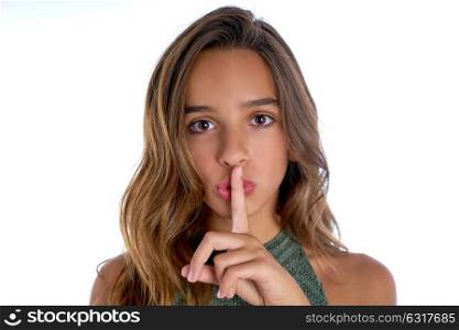 Brunette teen girl silence finger gesture on white background