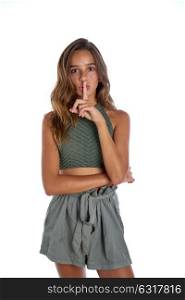 Brunette teen girl silence finger gesture on white background