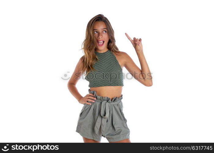 Brunette teenager girl portrait funny gesture on white background