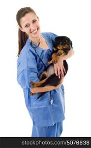 Brunette veterinary with a rottweiler puppy dog isolated on white background