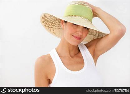 Brunette wearing straw hat