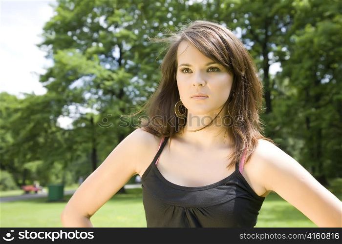 Brunette Woman In The Summer Park