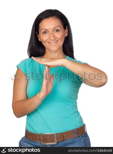 Brunette woman making the symbol of downtime isolated on white background