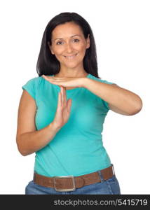 Brunette woman making the symbol of downtime isolated on white background