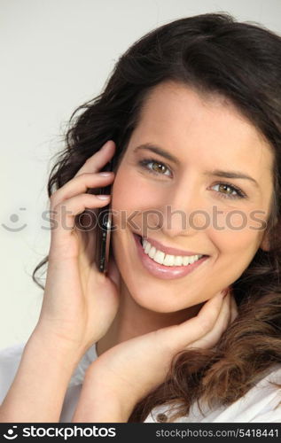 Brunette woman on the phone