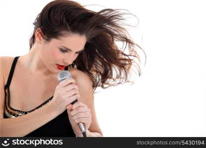 Brunette woman singing