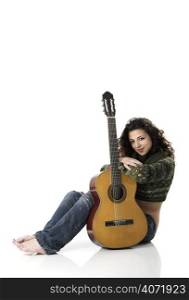 Brunette woman with acoustic guitar