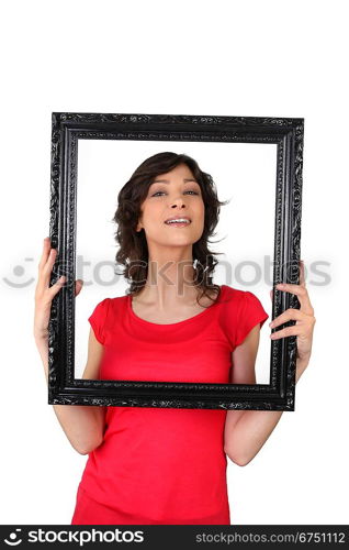 Brunette woman with black frame