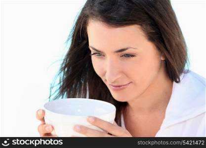Brunette woman with bowl