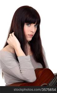 Brunette woman with guitar