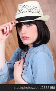 Brunette woman with hat