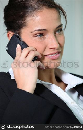 Brunette woman with mobile