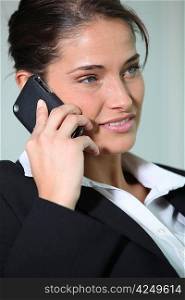 Brunette woman with mobile