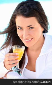 Brunette woman with orange juice