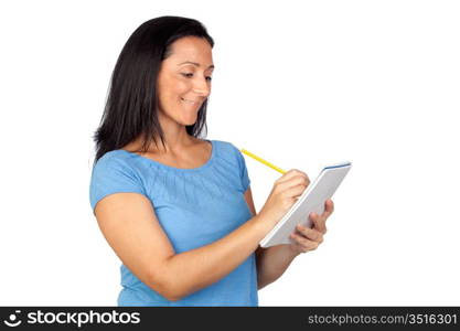 Brunette woman writing in a notebook isolated on a over white background