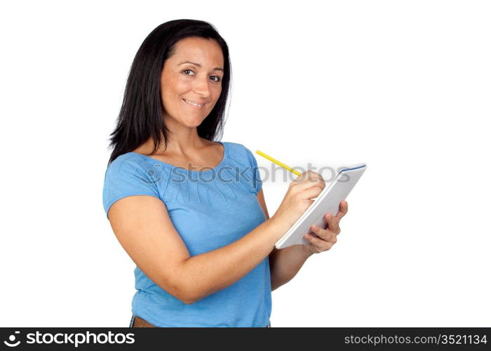 Brunette woman writing in a notebook isolated on a over white background