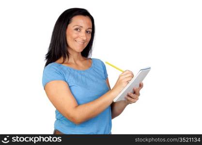 Brunette woman writing in a notebook isolated on a over white background