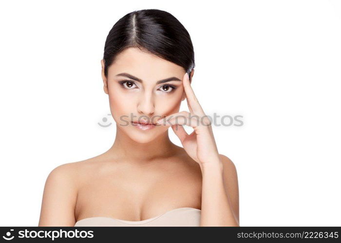 Brunette young woman with beautiful clean skin isoilated on white. Young brunette woman with beautiful clean skin