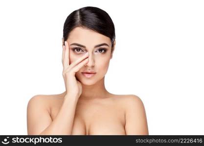 Brunette young woman with beautiful clean skin isoilated on white. Young brunette woman with beautiful clean skin