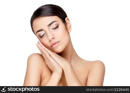 Brunette young woman with beautiful clean skin isoilated on white. Young brunette woman with beautiful clean skin