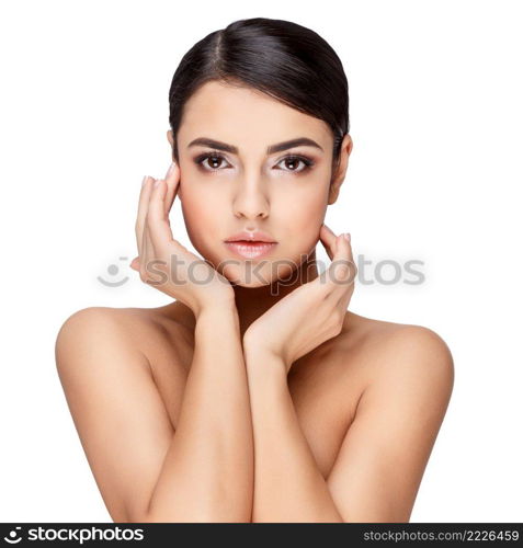 Brunette young woman with beautiful clean skin isoilated on white. Young brunette woman with beautiful clean skin