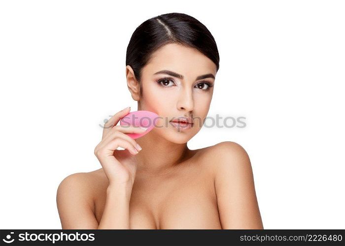 Brunette young woman with beautiful clean skin isolated on white. Young brunette woman with beautiful clean skin